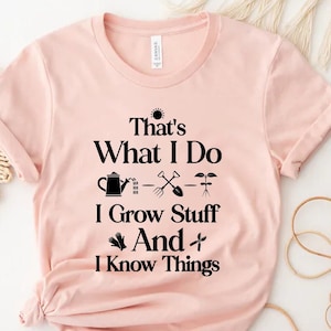 May include: A pink t-shirt with the text "That's What I Do I Grow Stuff And I Know Things" with gardening icons.