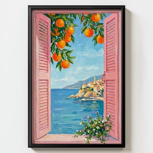 Könnte beinhalten: Gerahmtes Gemälde, das eine Küstenlandschaft durch rosa Fensterläden zeigt. Äste eines Orangenbaums, beladen mit Früchten, hängen über dem offenen Fenster. Das Gemälde zeigt ein blaues Meer, einen Himmel und ein Bergdorf.