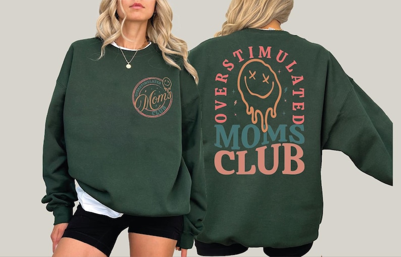 a woman wearing a green sweatshirt and shorts