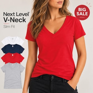 May include: A red V-neck t-shirt with a slim fit. The text Next Level V-Neck Slim Fit and a red circular badge with the text BIG SALE are visible. A column of four t-shirts in white, navy blue, red, and heather gray is displayed on the left side.