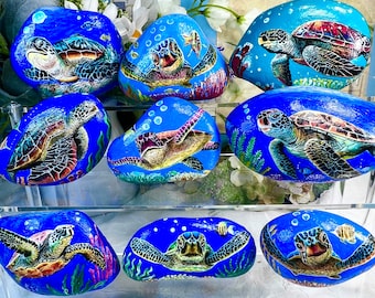Sea Turtle Painted Rock. Gentle sea turtle beckon to you in the beautiful underwater world.
