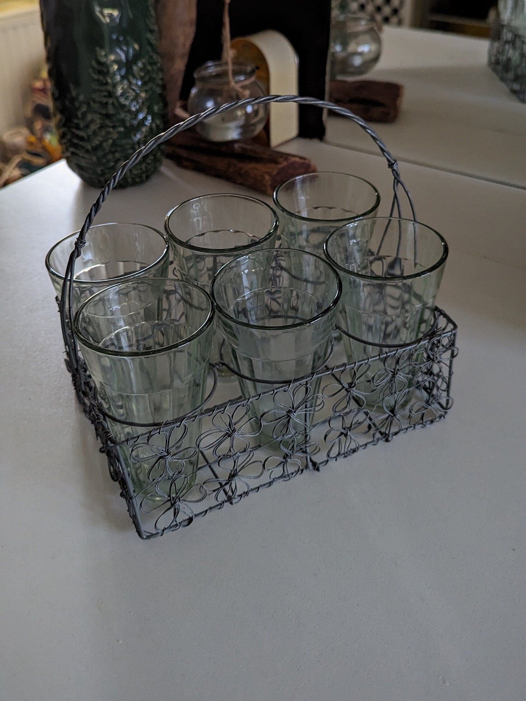 Vintage glasses set from 1920s in a metal holder