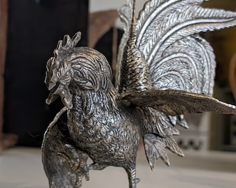 Antique metal fighting rooster