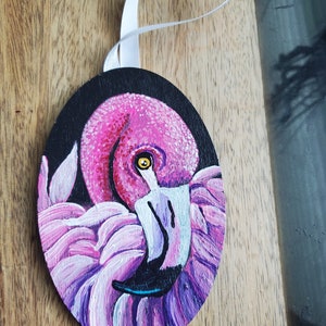 Handpainted tropical coastal flamingo with black background Christmas tree ornament