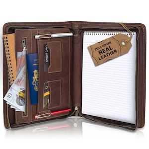 May include: Brown leather zipped portfolio with a notepad, pen holder, and multiple pockets. The portfolio has a tag that says "Full Grain Real Leather".