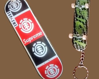 Supreme skateboard keychain Clearance