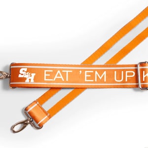 Sam Houston EAT &#39;EM UP - Correa ajustable para bolso, con licencia, estampada, para llevar en el portón trasero, aprobada para estadios, regalo de graduación, regreso a clases