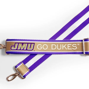May include: Purple and gold striped strap with the text "JMU GO DUKES" in white. The strap has two gold metal clasps.