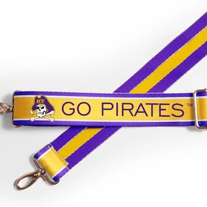May include: Purple and gold striped adjustable strap with a white stripe and the words "GO PIRATES" and a skull and crossbones logo with the letters "ECU".
