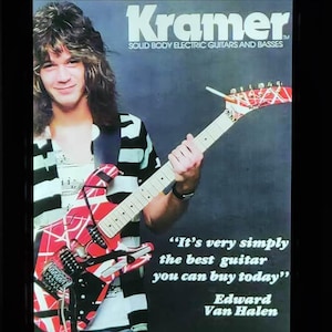 May include: Kramer guitar advertisement featuring a man holding a red, black, and white electric guitar. The text reads "Kramer SOLID BODY ELECTRIC GUITARS AND BASSES." Quote: "It's very simply the best guitar you can buy today" - Edward Van Halen.