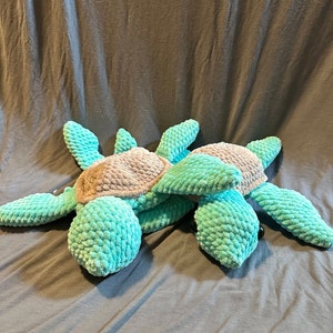 Simon la tortue de mer Snuggler et peluche