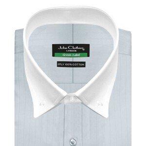 May include: A light blue dress shirt with a white collar and button-down front. The shirt has a subtle striped pattern and a label that reads "John Clothier London Green Label 2PLY 100% COTTON".
