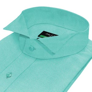 May include: A close-up of a turquoise dress shirt with a textured pattern. The shirt has a classic collar and buttoned cuffs. The label reads "John C".
