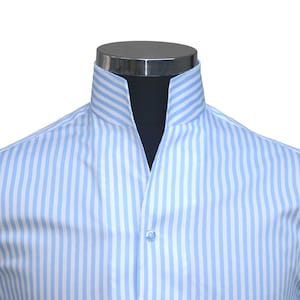 May include: A light blue striped dress shirt with a mandarin collar.