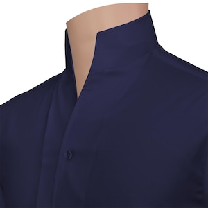 May include: A close-up of a navy blue shirt with a mandarin collar. The shirt is buttoned at the neck and has a smooth, wrinkle-free appearance. The collar stands up around the neck.