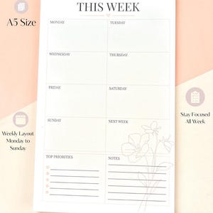 May include: A white A5 weekly planner notepad featuring the text THIS WEEK at the top. The layout includes sections for Monday through Sunday, a section for next week, a top priorities list with bullet points, and a notes section with a floral line art.