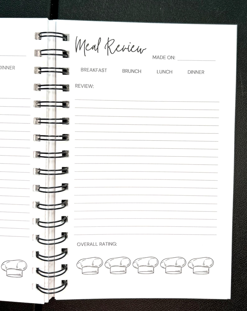 May include: A spiral-bound notebook page titled Meal Review with fields for date, meal type selection including breakfast, brunch, lunch, and dinner, a lined section for written notes, and an overall rating area featuring five chef hat icons.
