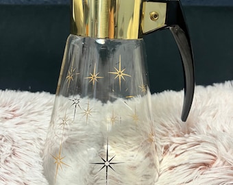 Mid Century Modern Vintage Coffee Carafe with Gold Starburst adorning the Carafe by Corning Ware