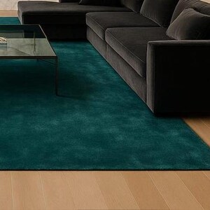 Soft hand-tufted nursery rug in dark green custom size.