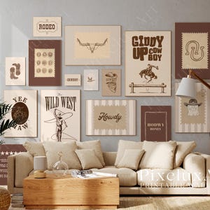 May include: A selection of framed art prints with a Western theme, featuring images of cowboys, rodeos, and the word "Howdy". The colour scheme is neutral, with brown and beige tones, creating a rustic aesthetic.