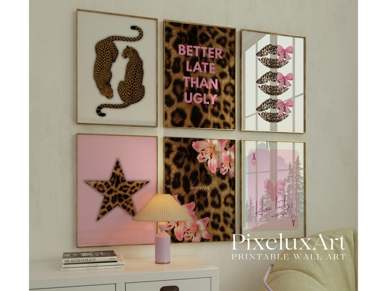 May include: A collection of framed wall art featuring leopard print, pink, and floral designs. One piece displays the text "Better Late Than Ugly." Other art includes leopard print lips with pink bows, a star, and a forest scene.