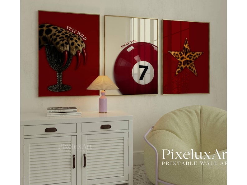 May include: Three framed wall art prints. One shows a leopard paw in a glass with the text "STAY WILD". Another features a red billiard ball with the number 7. The last print has a leopard print star.