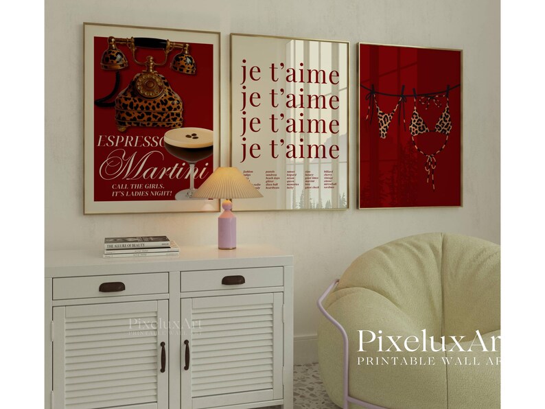 May include: Three framed wall art prints. The left print features a red background with a leopard print telephone and a martini glass. The middle print has the words "je t'aime" repeated. The right print shows a leopard print bikini. A pink lamp sits on a white cabinet.