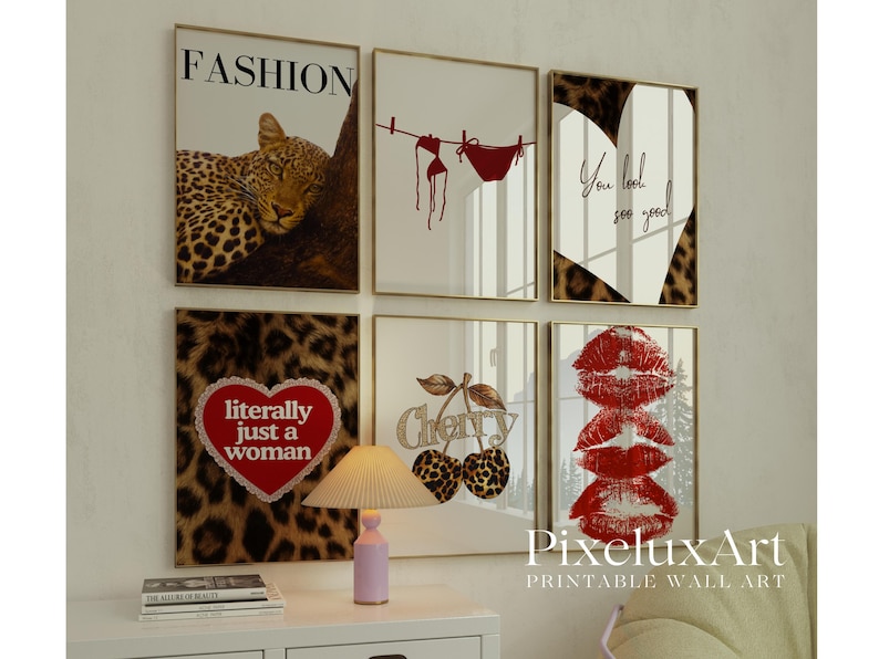 May include: Six framed wall art prints with gold frames. The prints feature a leopard, a red bikini, a heart with leopard print, a heart with the text "literally just a woman", cherries, and red lips. The word "FASHION" is at the top of one print.