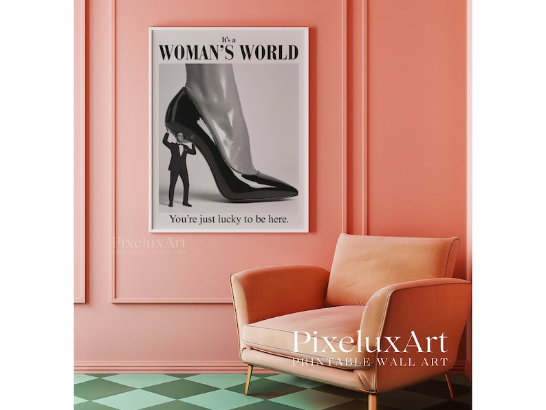 May include: A framed print with the text "It's a Woman's World" and "You're just lucky to be here." The artwork depicts a high-heeled shoe with a man in a suit beneath it. The room has a peach-colored wall and a green and white checkered floor.