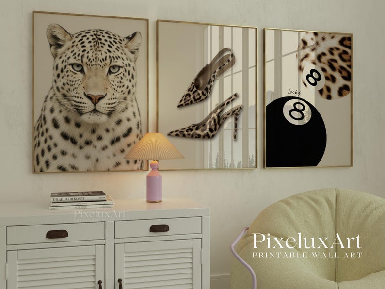 May include: Three framed wall art prints. The first features a leopard's face. The second shows high-heeled shoes with a leopard print. The third displays a black eight-ball with the number 8 and the word "Lucky".