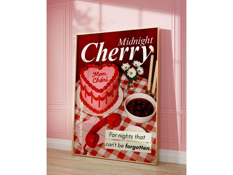 May include: A framed print with a red and white checkered background features a heart-shaped cake with "Mon Ch&eacute;ri" on it, cherries, daisies, candles, and a red telephone. The text "Midnight Cherry" and "For nights that can't be forgotten" are also visible.