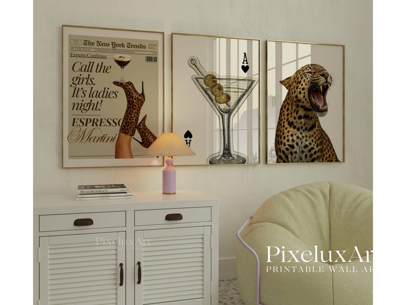 May include: Set of three framed prints. One features a martini glass with olives and playing card symbols. Another shows a leopard print boot holding a martini glass with text that reads "Call the girls. It's ladies night! Espresso Martini." The third print is a leopard.