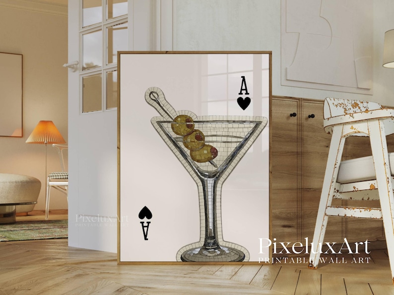 May include: Printable wall art featuring a martini glass with olives and the Ace of Spades. The martini glass is filled with a mosaic pattern. The artwork is framed in a gold-colored frame. The text "PixeluxArt PRINTABLE WALL ART" is visible.