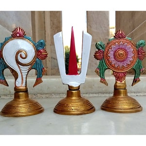 Shankh Chakra Namah Decorative pure brass hand painted for Home,Office & Room,Also Gift for House Warming hiight  around 14 cm weight 1 kg.