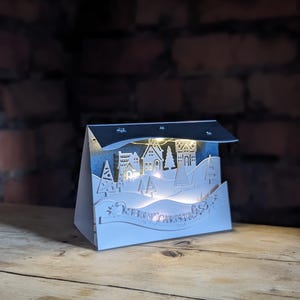 Oplichtende kerstkaart