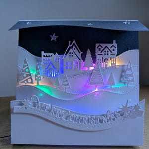 Tarjeta de pueblo navideño en 3D, tarjeta de recuerdo en caja para alguien especial
