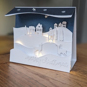 carte de Noël 3D faite main avec mini lumières LED | Illuminer le village de Noël