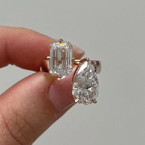 Toi Et Moi Moissanite Ring: Emerald & Pear Cut, 14K Yellow Gold Cuff