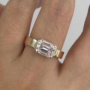 9x7 MM Emerald Cut Moissanite East To West Style Ring, Bezel Set Anniversary Ring, One Diamond Modern Ring, 14k Yellow Gold Ring, Thick Ring