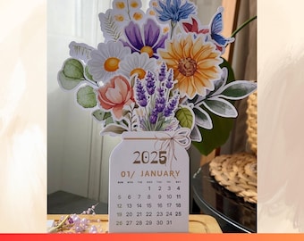 May include: A printable 2025 calendar featuring a floral bouquet in a mason jar. The calendar is in English and includes the months of January through December. The floral bouquet is made up of purple, pink, yellow, and white flowers.