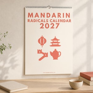 May include: A wall calendar titled Mandarin Radicals Calendar 2027 with a cream background and coral-colored text. The design features four icons: a lantern, a pagoda, a section of the Great Wall, and a teapot, all in a matching coral color.
