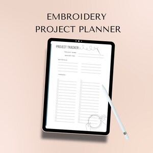 May include: A digital embroidery project planner displayed on a tablet. The screen shows a project tracker with sections for project name, materials, and threads. A white stylus rests on the screen. The text "EMBROIDERY PROJECT PLANNER" is at the top.