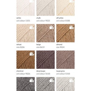 May include: A color chart titled "Sweater Colors" displays various yarn colors. The chart includes swatches of white, chalk, off-white, wheat, beige, almond, chestnut, deep taupe, taupe grey, dark grey, grey, and pearl grey. Each swatch has a color name and a corresponding code.