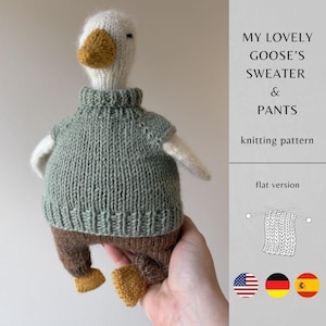 May include: A handmade knitted goose doll wearing a green sweater and brown pants. The goose has a white head, a yellow beak and feet, and white wings. The text on the image says "MY LOVELY GOOSE'S SWEATER & PANTS knitting pattern".