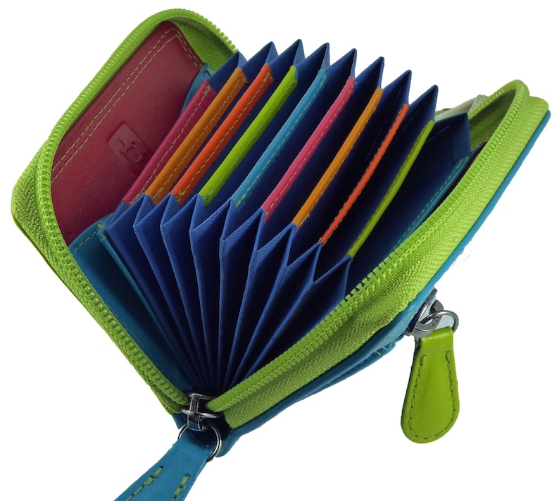 May include: Open, zippered wallet with a lime green exterior and a blue interior. The wallet is filled with colorful card slots in shades of orange, pink, and green. A teal blue leather pull tab is attached to the zipper.
