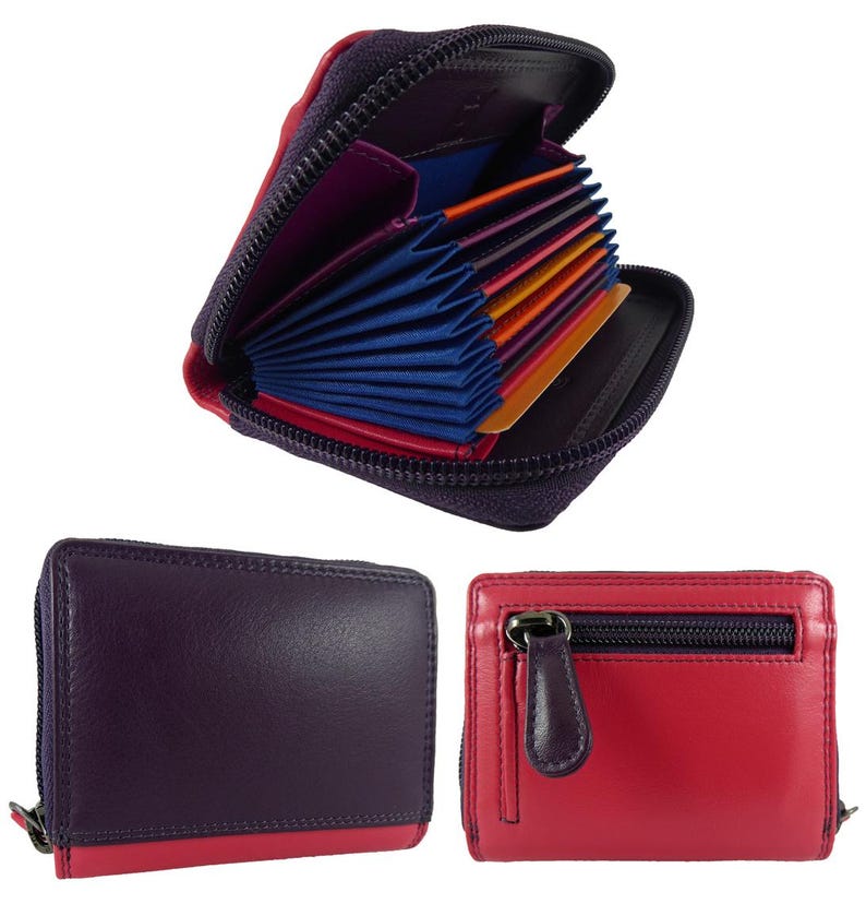 May include: A collection of leather wallets in various colors. One wallet is open, revealing multiple card slots in shades of blue, orange, and pink. The wallets are primarily purple and red, with black zippers and accents. The wallets are designed for carrying cards and cash.