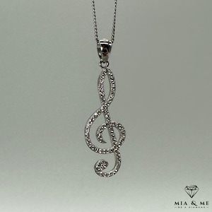 Silver pendant / treble clef / musical note with zirconia made of 925 silver