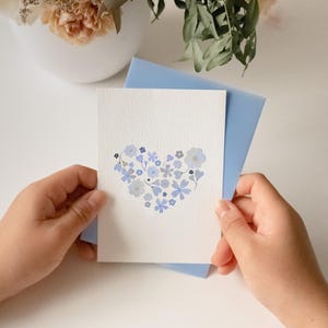 Carte de voeux coeur bleu