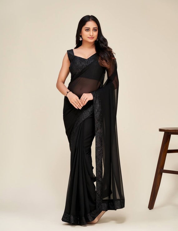 Sabyasachi plain black saree with belt