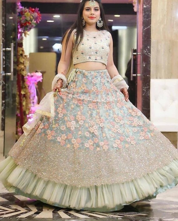 Top wedding lehenga clearance designers